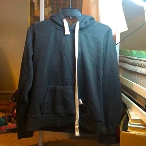 A black womens heritage hoodie.